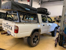 Load image into Gallery viewer, Toyota Hilux (1999-2005) OzRoo Tub Rack - Half Height & Full Height