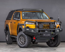 Load image into Gallery viewer, Toyota HiLux N90 (26+) Ironman Deluxe Bull Bar & Loom Kit