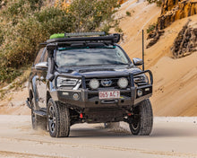 Load image into Gallery viewer, Toyota HiLux N80 (20-25) Ironman Deluxe Bull Bar &amp; Loom Kit
