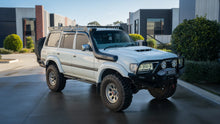 Load image into Gallery viewer, Toyota Landcruiser 80 Series (1990-1997) Tier One Metalworks Roof Rack
