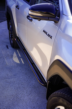 Load image into Gallery viewer, Toyota Hilux (2026-2028) N90 (ANGLED) Phat Bars Rock Sliders/Side Steps – Powdercoated
